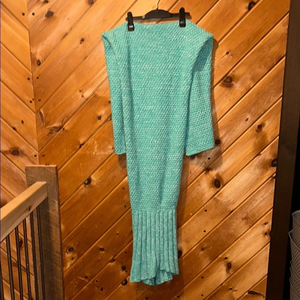 Handmade teal crocheted mermaid tail blanket
